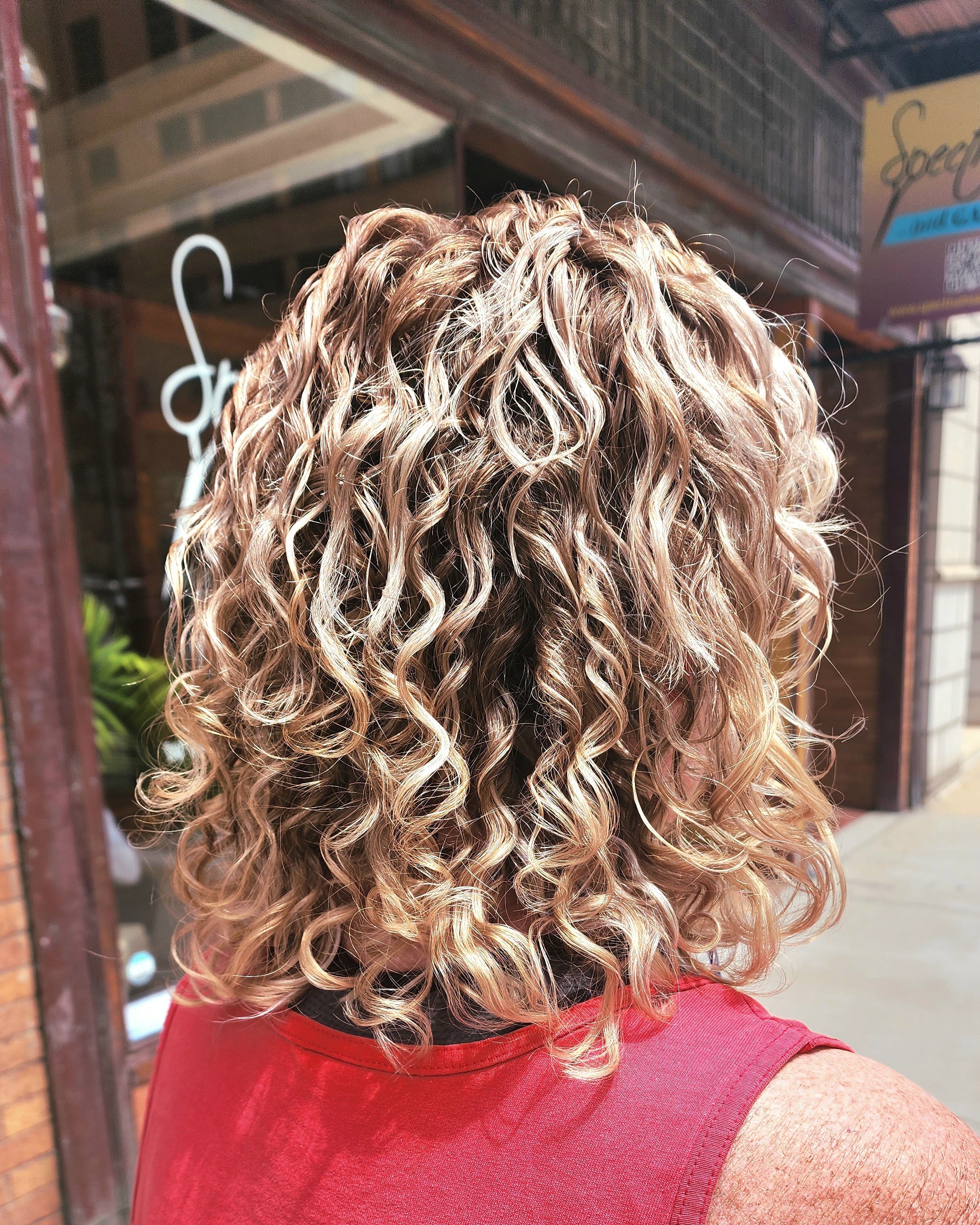 Curly blonde hair in Milwaukee